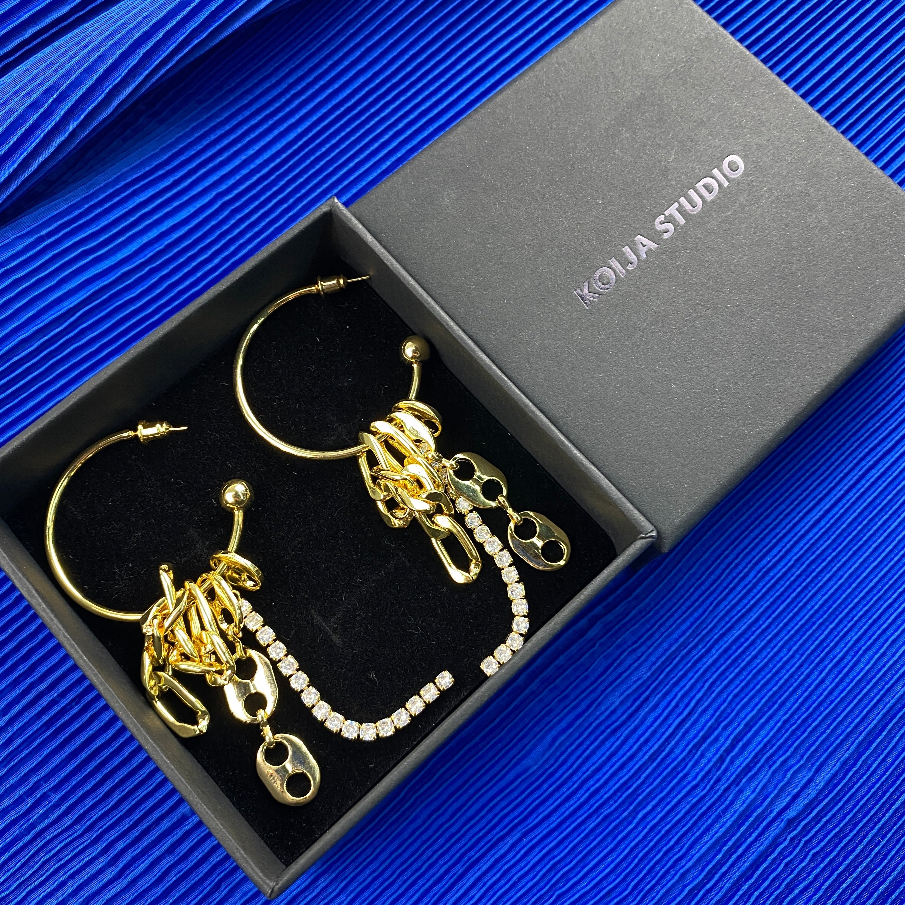 猪鼻扣水钻流苏耳环